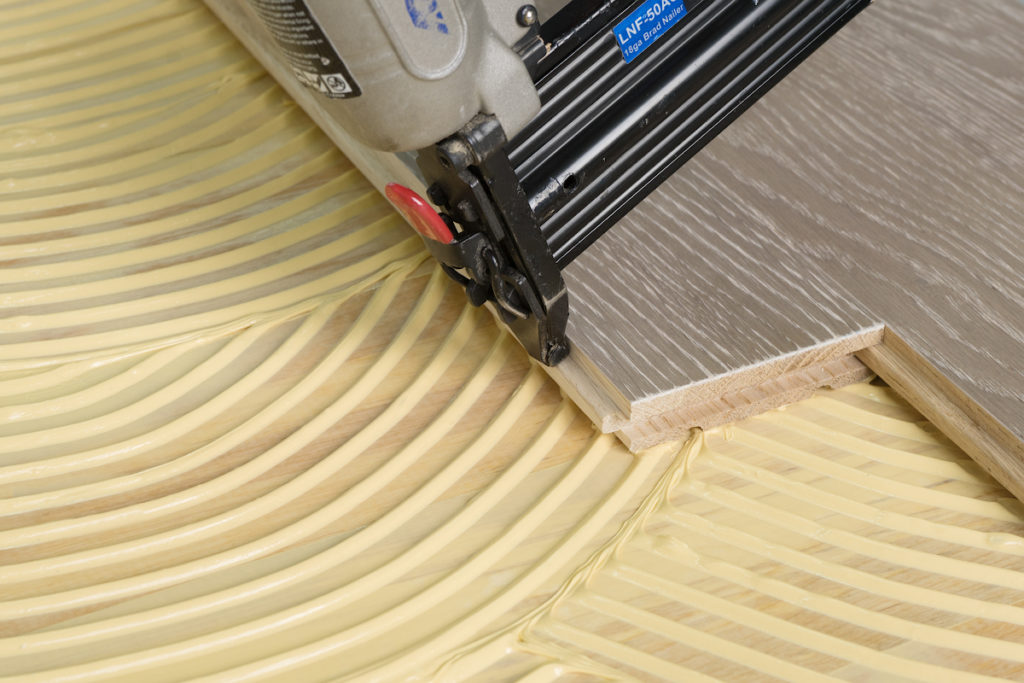 FLOORING FIXATION WITH CLAMPS Coswick Coatings and Adhesives